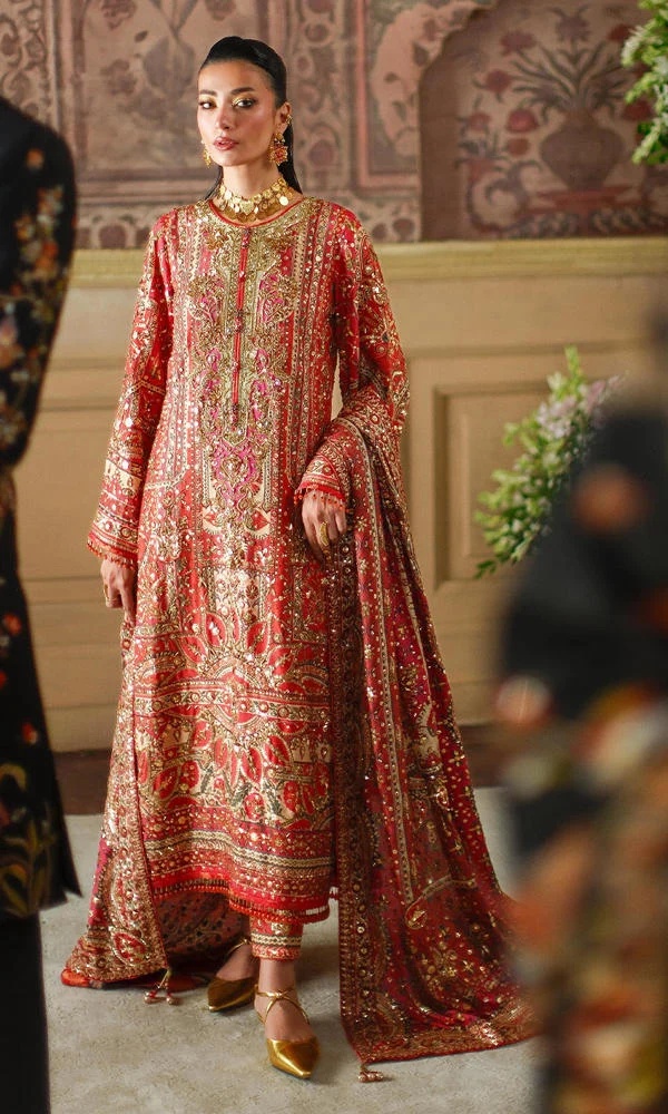 CRIMSON TALE I NOMI ANSARI clothing in gold, red tones.